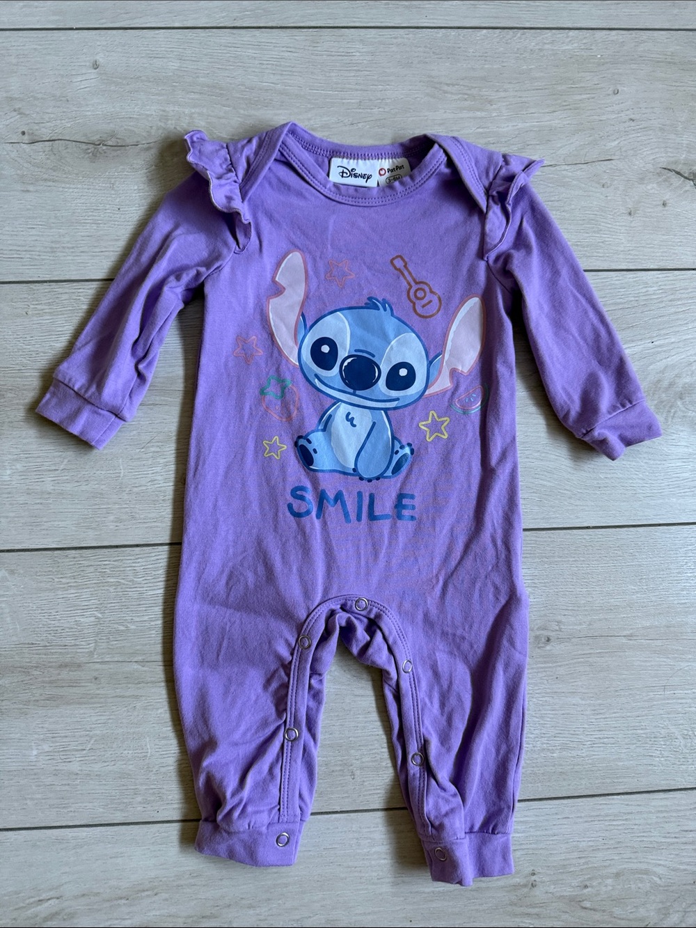 Disney Purple Stitch 'Smile' Baby Footie